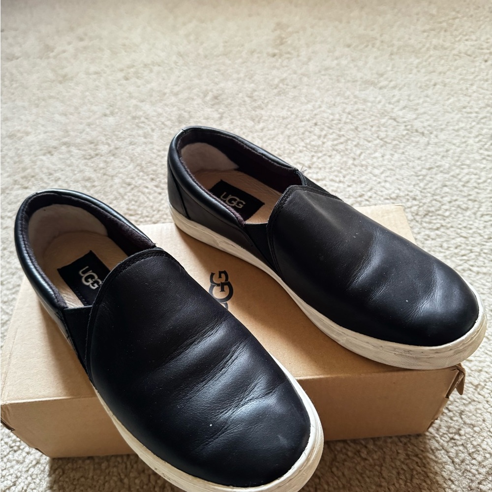UGG women’s Black Leather Slip-Ons. Used